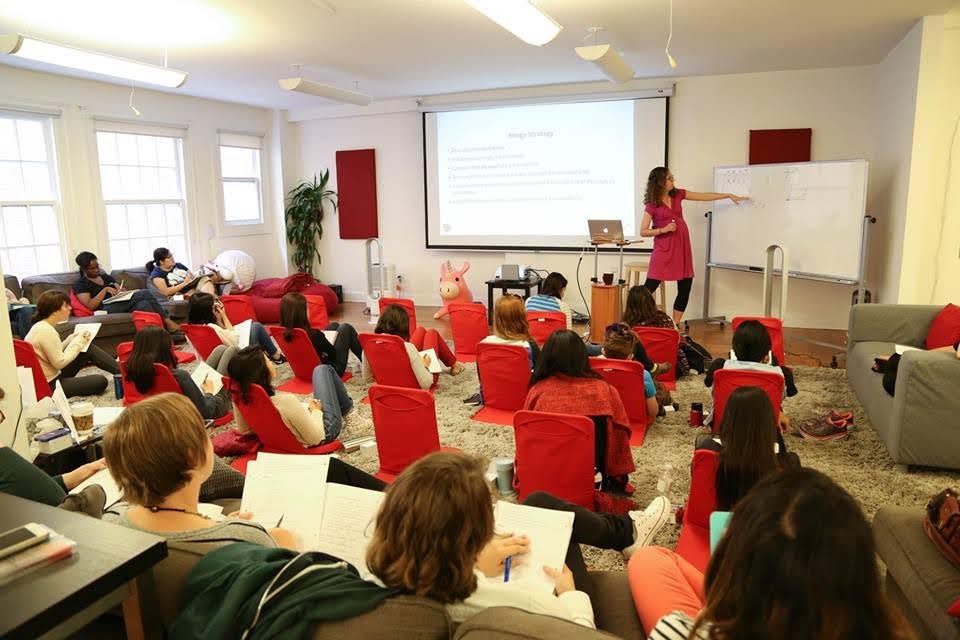 me, teaching sorting algorithms, at an all-women coding academy in 2015